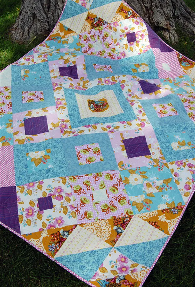 Read more about the article Tumbling Jewels Quilt