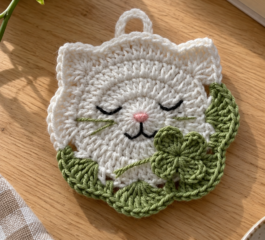 Sleeping Cat with Four-Leaf Clover